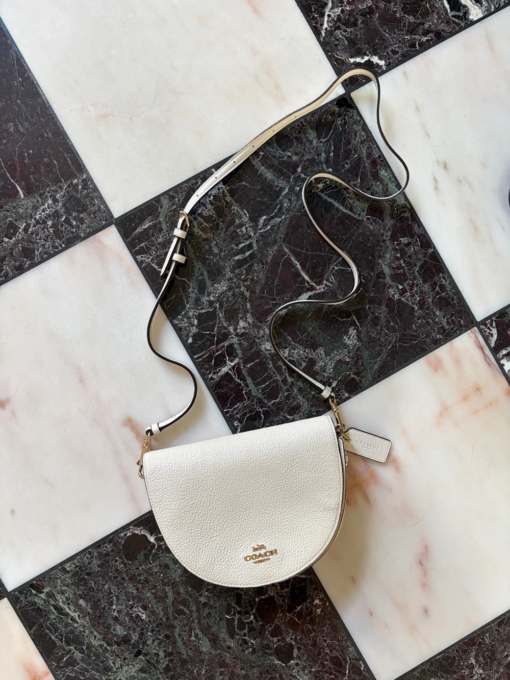 Coach ivory half moon Pebbled Leather Saddle Crossbody Bag